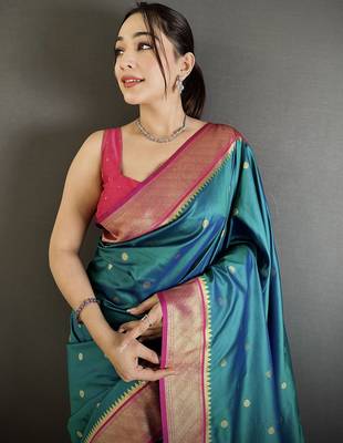 Women teal peacock motifs lichi silk blend saree 4