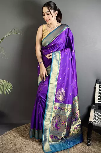 Women purple peacock motifs lichi silk saree