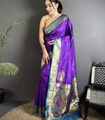 Women purple peacock motifs lichi silk saree