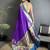 Women purple peacock motifs lichi silk saree