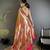 Women peach ikkat floral motifs lichi silk saree