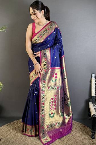 Women royal blue ikkat floral motifs lichi silk saree