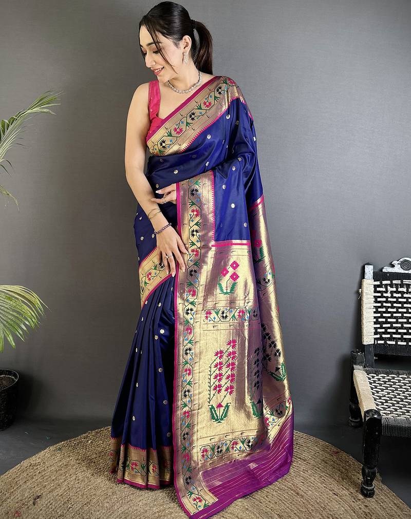 Women royal blue ikkat floral motifs lichi silk saree