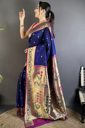 Women royal blue ikkat floral motifs lichi silk saree