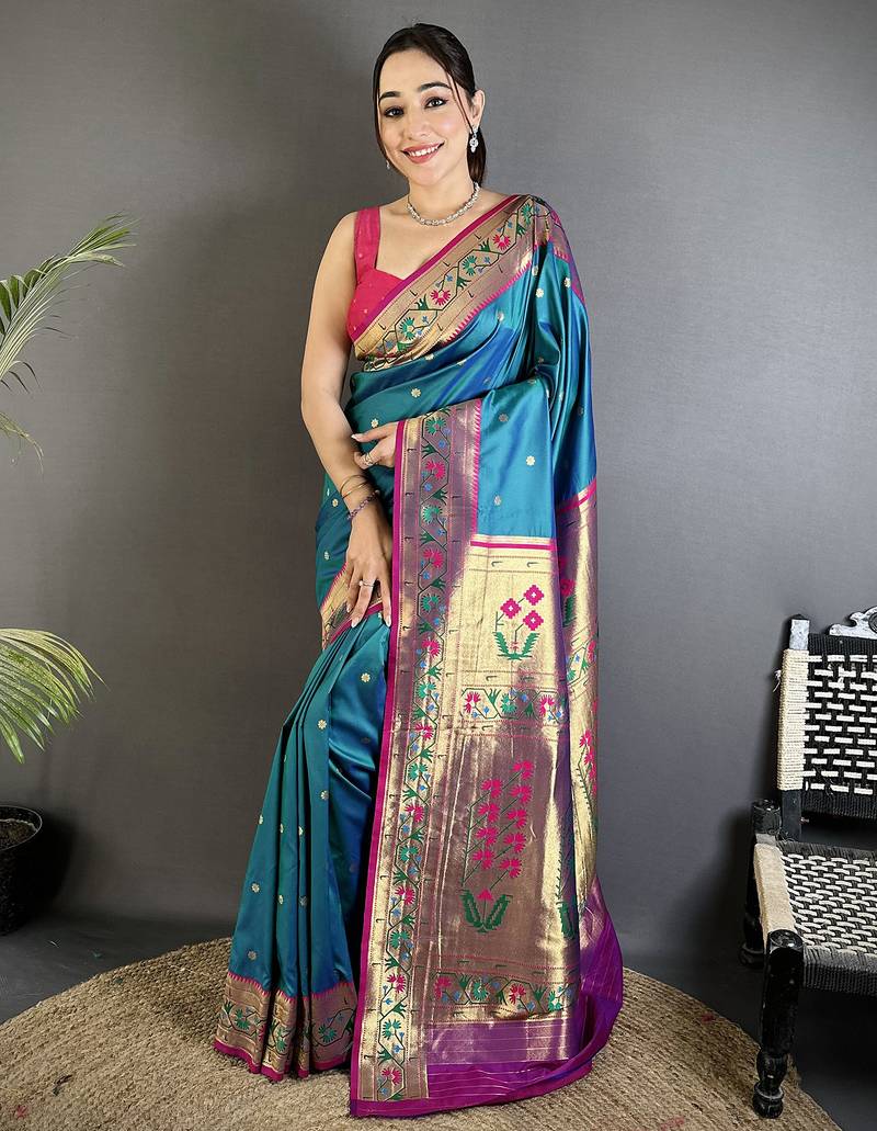 Women teal blue ikkat floral motifs lichi silk saree