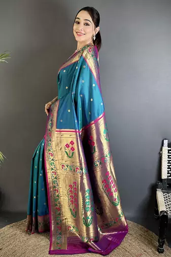 Women teal blue ikkat floral motifs lichi silk saree