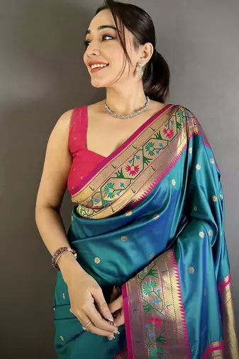 Women teal blue ikkat floral motifs lichi silk saree