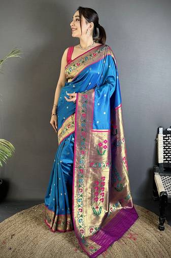 Women blue ikkat floral motifs lichi silk saree