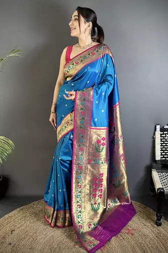 Women blue ikkat floral motifs lichi silk saree