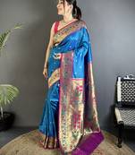 Women blue ikkat floral motifs lichi silk saree