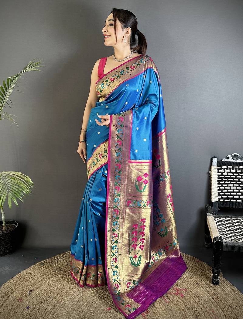 Women blue ikkat floral motifs lichi silk saree