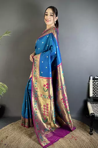 Women blue ikkat floral motifs lichi silk saree