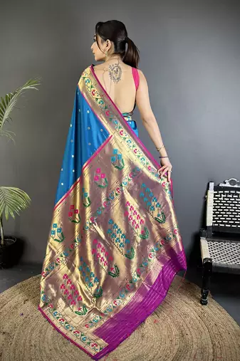 Women blue ikkat floral motifs lichi silk saree