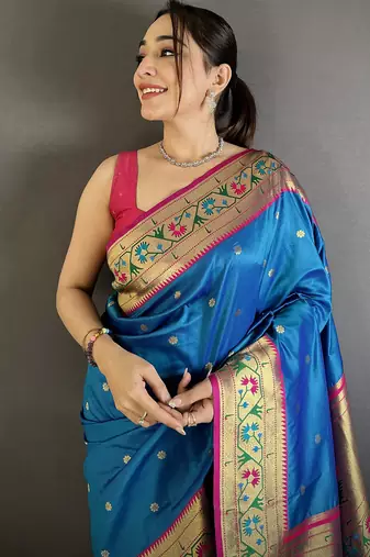 Women blue ikkat floral motifs lichi silk saree