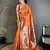 Women orange ikkat floral motifs lichi silk saree
