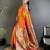 Women orange ikkat floral motifs lichi silk saree