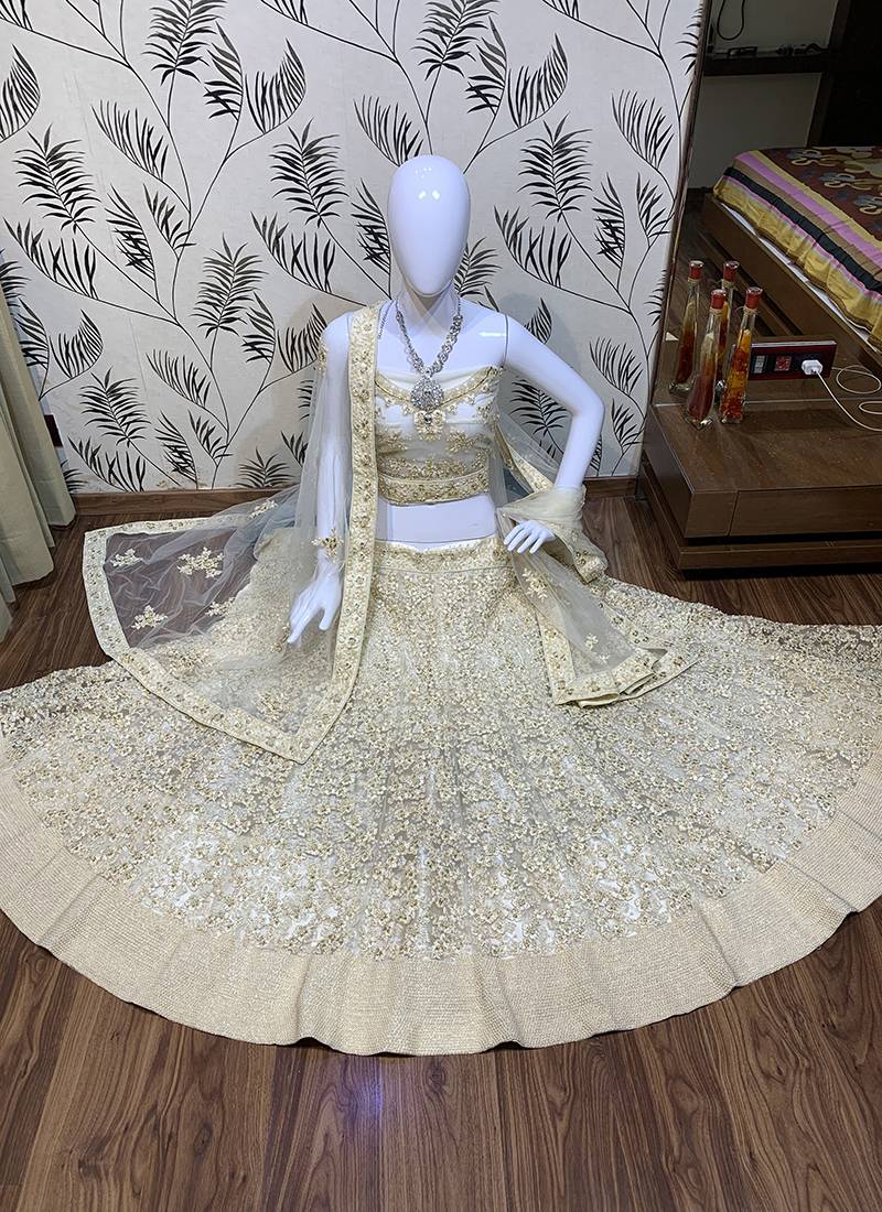 Soft Premium Net Wedding Lehenga In Off White Color With Embroidery & Pearl Work
