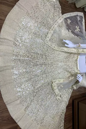 Soft Premium Net Wedding Lehenga In Off White Color With Embroidery & Pearl Work