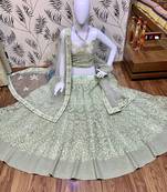 Soft Premium Net Wedding Lehenga In Green With Embroidery & Pearl Work