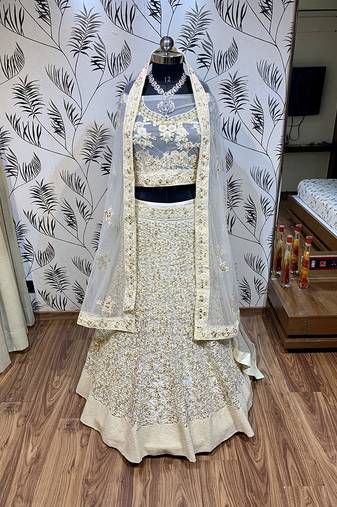 Soft Premium Net Wedding Lehenga In Off White Color With Embroidery & Pearl Work