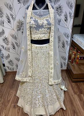 Soft Premium Net Wedding Lehenga In Off White Color With Embroidery & Pearl Work 2