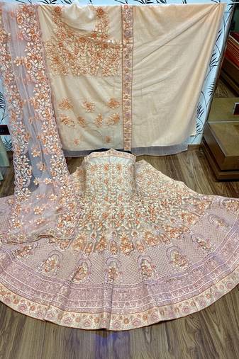 Soft Premium Net Wedding Wear Lehenga In Peach WIth Embroidery & Pearl Work