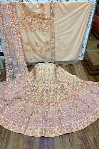 Soft Premium Net Wedding Wear Lehenga In Peach WIth Embroidery & Pearl Work