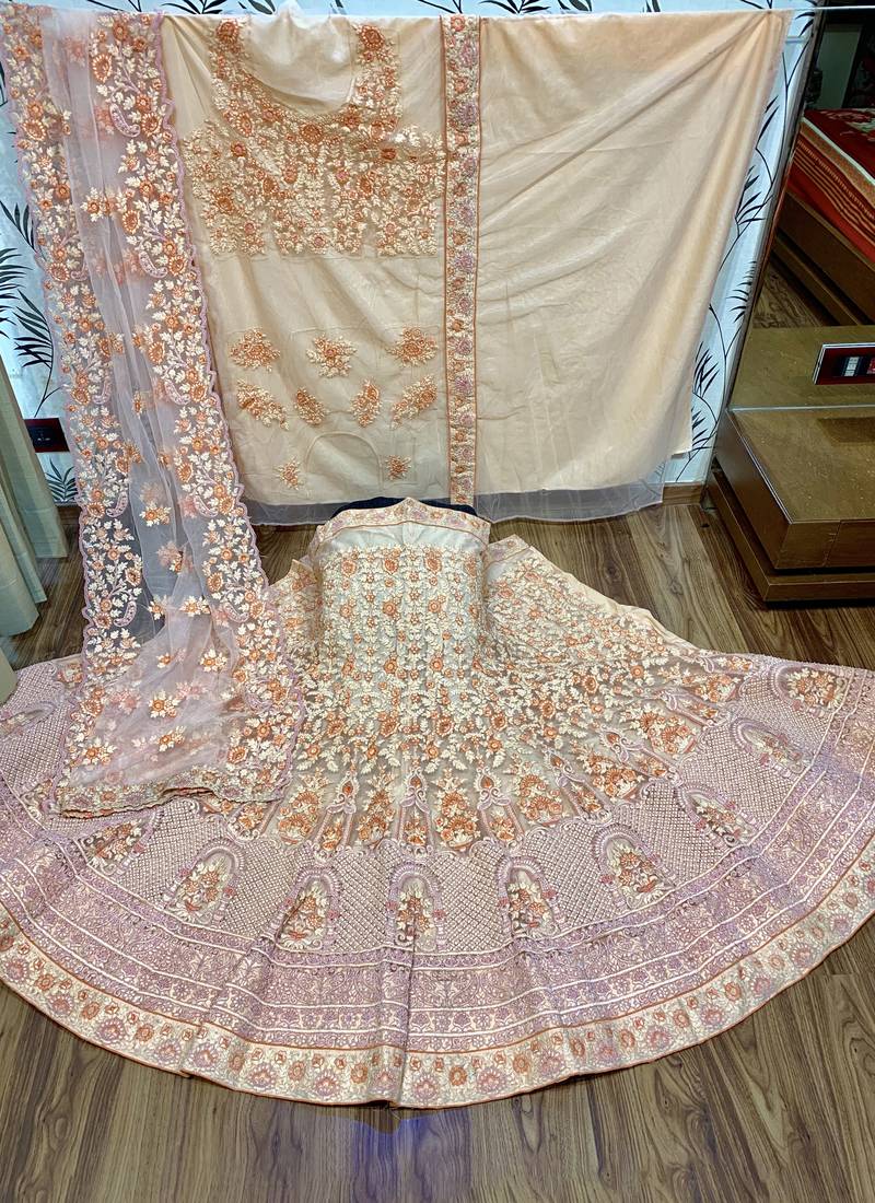 Soft Premium Net Wedding Wear Lehenga In Peach WIth Embroidery & Pearl Work