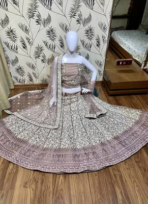 Soft Premium Net Wedding Wear Lehenga In Dusty Pink With Luckhnowi Work & Stone Work 1