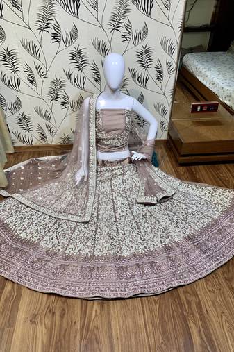 Soft Premium Net Wedding Wear Lehenga In Dusty Pink With Luckhnowi Work & Stone Work