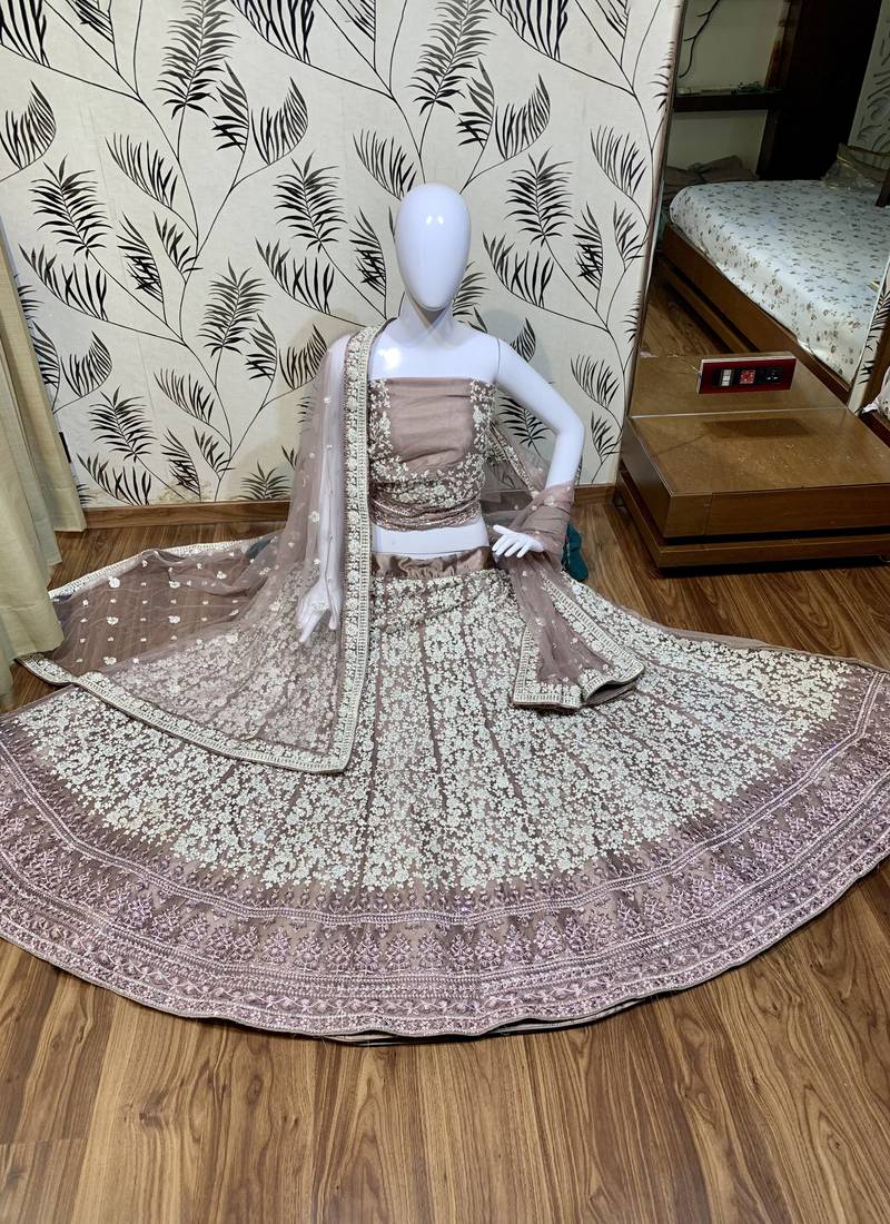 Soft Premium Net Wedding Wear Lehenga In Dusty Pink With Luckhnowi Work & Stone Work