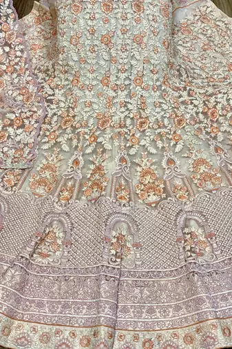 Soft Premium Net Wedding Wear Lehenga In Peach WIth Embroidery & Pearl Work