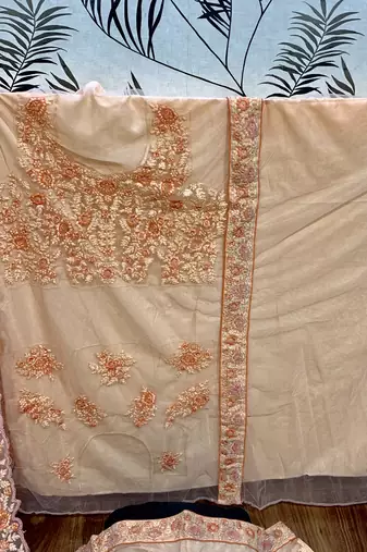 Soft Premium Net Wedding Wear Lehenga In Peach WIth Embroidery & Pearl Work
