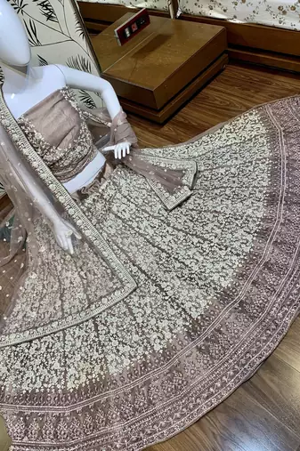 Soft Premium Net Wedding Wear Lehenga In Dusty Pink With Luckhnowi Work & Stone Work