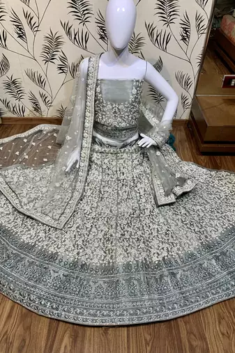 Soft Premium Net Wedding Wear Lehenga In Ravishing Grey With Luckhnowi Work & Stone Work