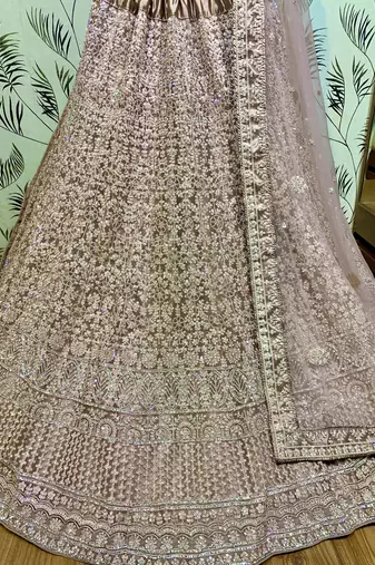 Soft Premium Net Wedding Wear Lehenga In Dusty Pink With Luckhnowi Work & Stone Work