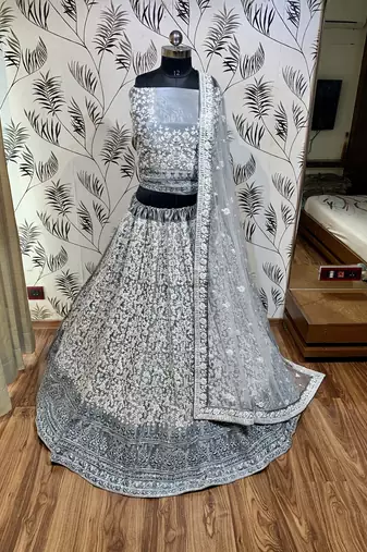 Soft Premium Net Wedding Wear Lehenga In Ravishing Grey With Luckhnowi Work & Stone Work