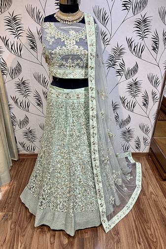 Soft Premium Net Wedding Lehenga In Green With Embroidery & Pearl Work