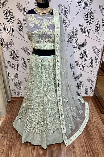 Soft Premium Net Wedding Lehenga In Green With Embroidery & Pearl Work