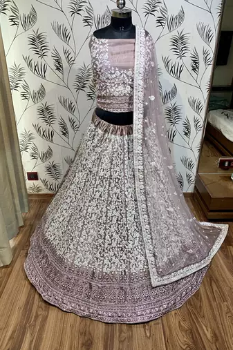 Soft Premium Net Wedding Wear Lehenga In Dusty pink With Luckhnowi Work & Stone Work