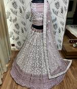 Soft Premium Net Wedding Wear Lehenga In Dusty pink With Luckhnowi Work & Stone Work