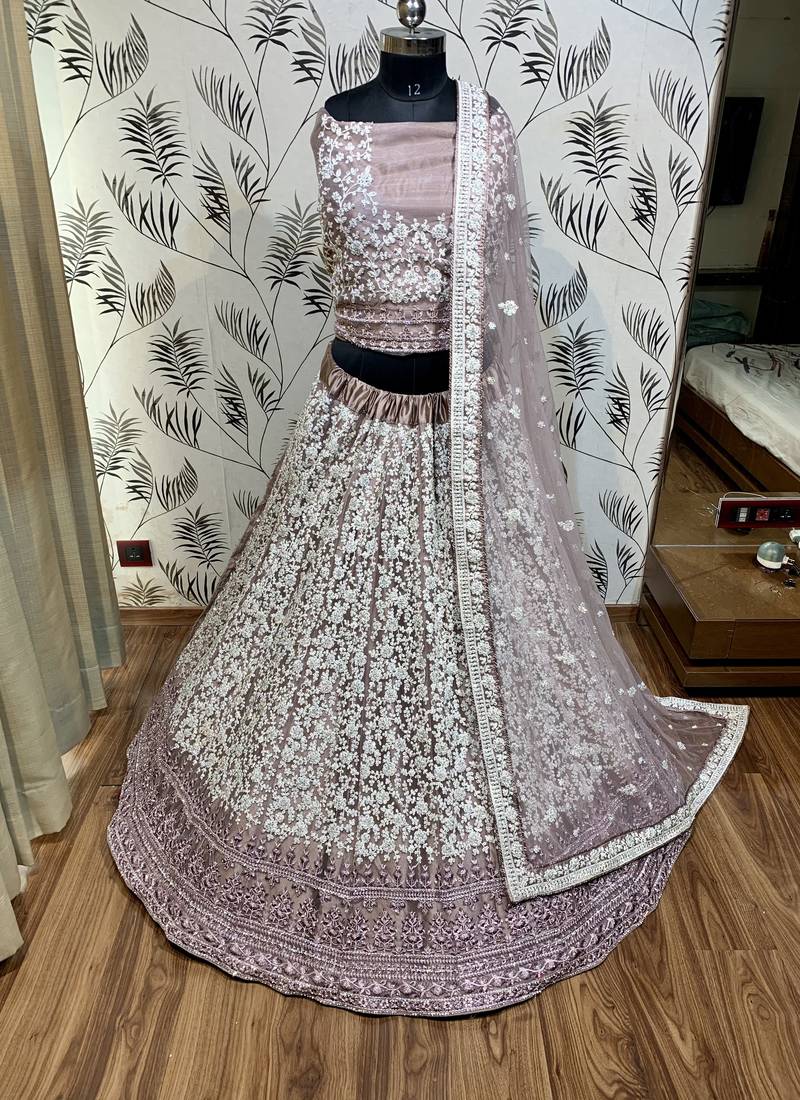 Soft Premium Net Wedding Wear Lehenga In Dusty pink With Luckhnowi Work & Stone Work