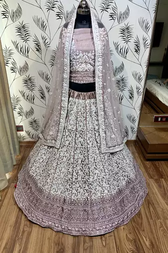 Soft Premium Net Wedding Wear Lehenga In Dusty pink With Luckhnowi Work & Stone Work