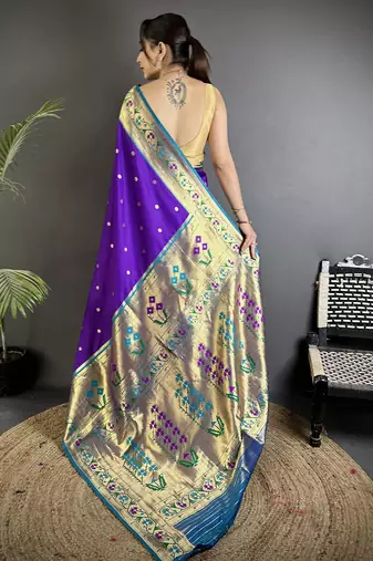 Women purple ikkat floral motifs lichi silk saree