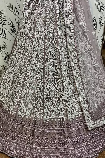 Soft Premium Net Wedding Wear Lehenga In Dusty pink With Luckhnowi Work & Stone Work