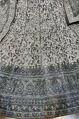 Soft Premium Net Wedding Wear Lehenga In Ravishing Grey With Luckhnowi Work & Stone Work
