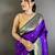Women purple ikkat floral motifs lichi silk saree