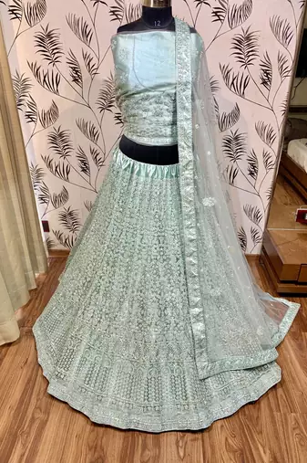 Soft Premium Net Wedding Wear Lehenga In Light Sea Green With Luckhnowi Work & Stone Work