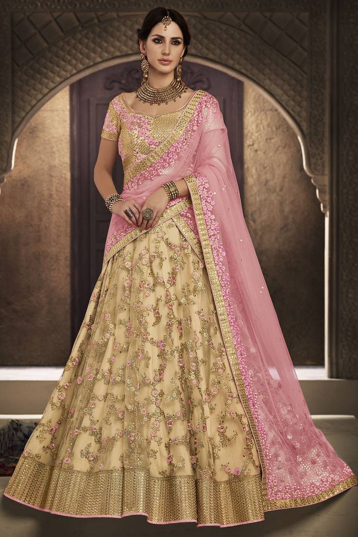 Soft Premium Net Wedding Lehenga In Golden With Embroidery & Stone Work