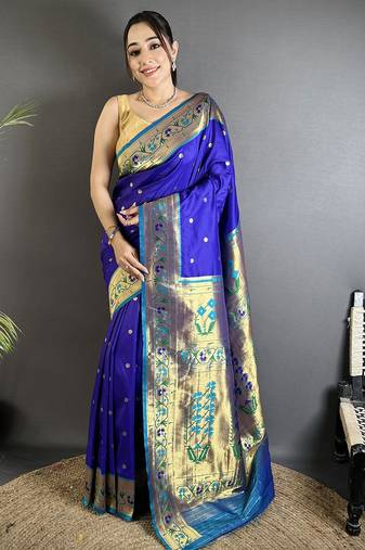 Women blue ikkat floral motifs lichi silk saree